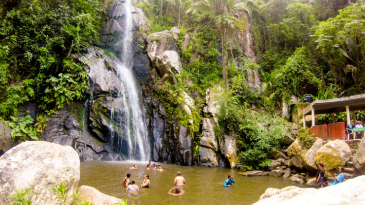 People enjoying the waterfall in Yelapa, Puerto Vallarta.