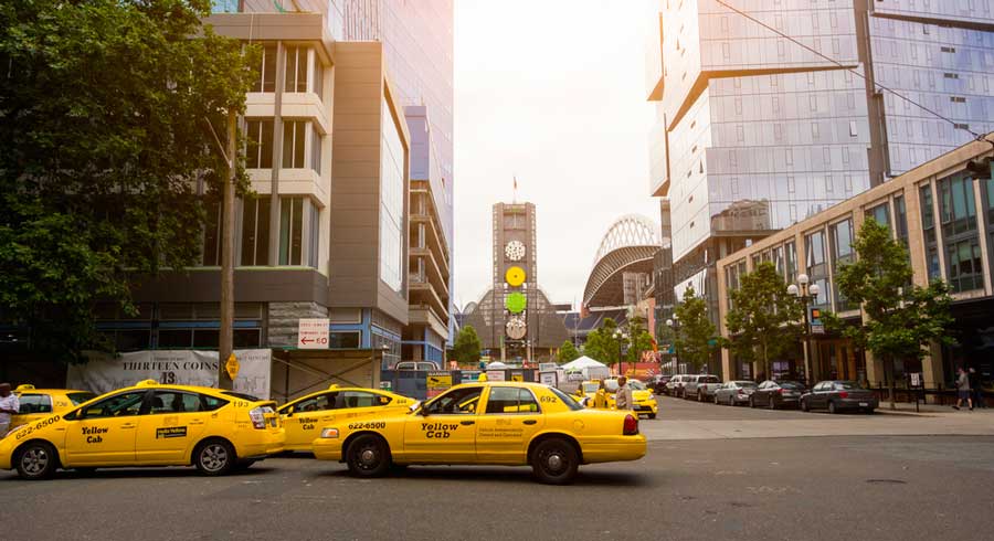 View of yellow taxis across the road in Seattle