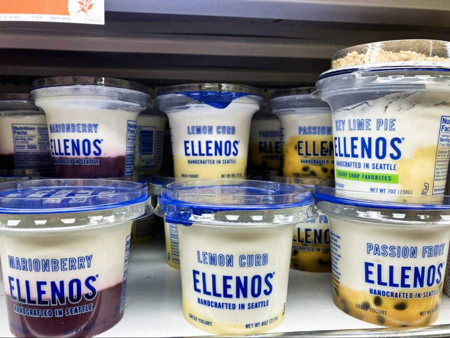Different flavors of yogurt displayed on a shelf
