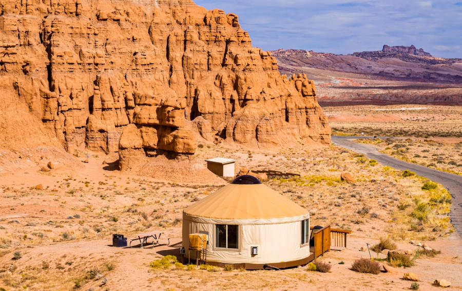 View of a yurt with a scenic view of the rock formations in the background