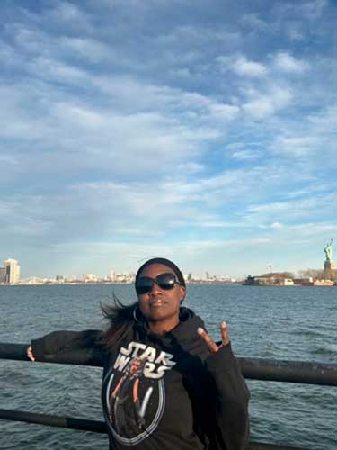 Yvette Griffith posing for a photo at the Liberty State Park,