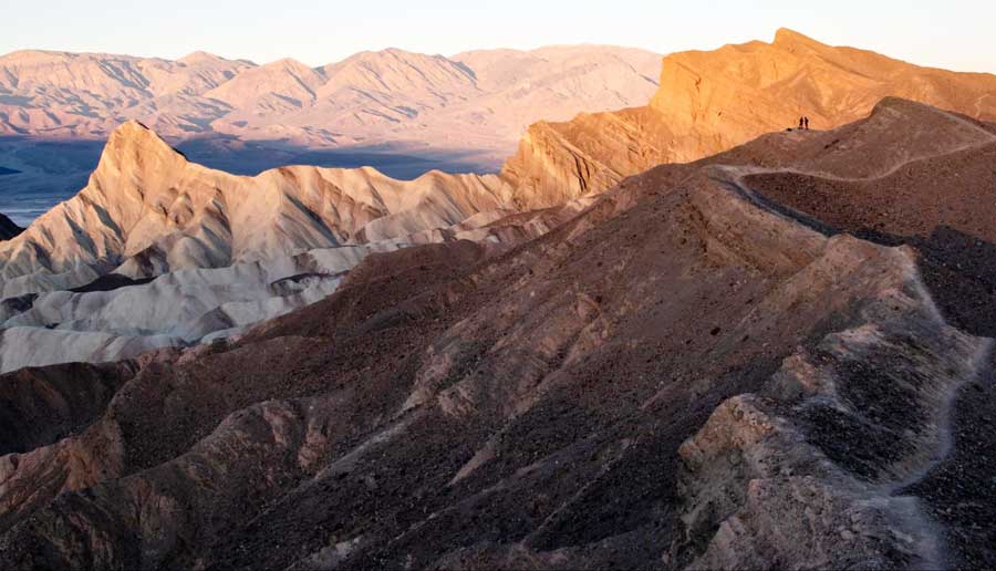 The Zabriskie Point in Death Valley National Park during sunrise