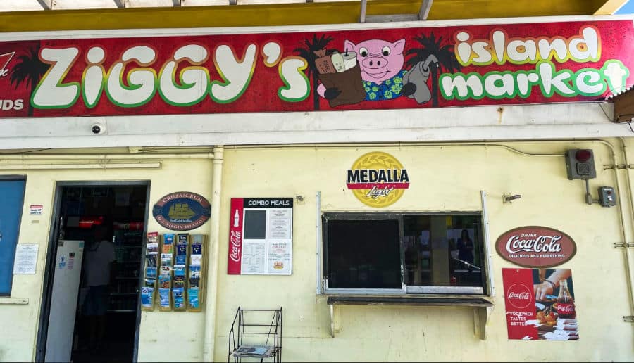 View outside Ziggy’s Island Market with their big banner at the top