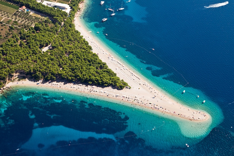 An aerial shot of Zlatni Rat Beach near Bol on Brac Island