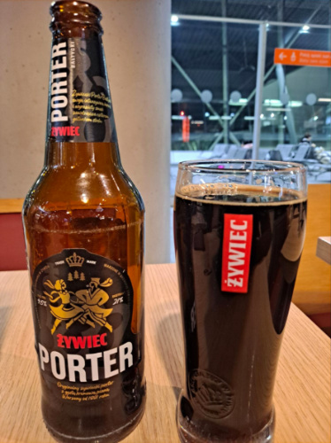 A bottle and glass of Zywiec Porter beer
