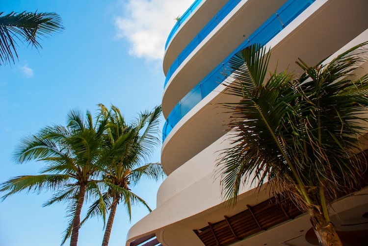 A hotel and palm trees in Playa del Carmen