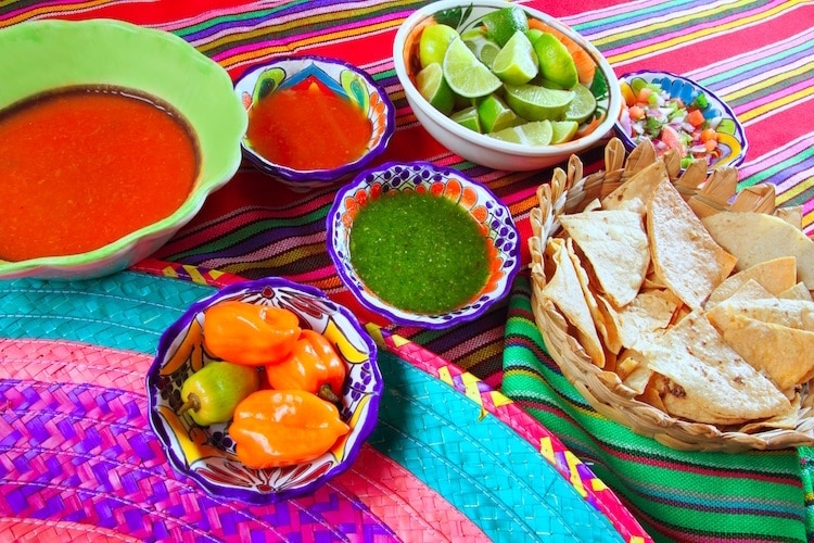 Mexican food varied chili sauces nachos lemon Mexico flavor