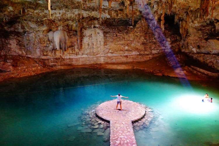 Travel Lemming's founder, Nate Hake in an underground river