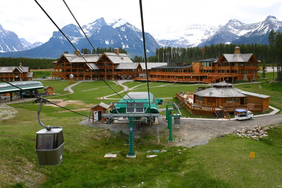 A summertime photo of Lake Louise Ski resort -- the gondolas being used as sightseeing lifts