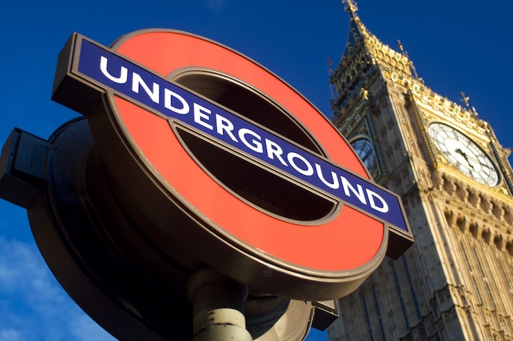 A London Underground sign outside The Houses of Parliament.