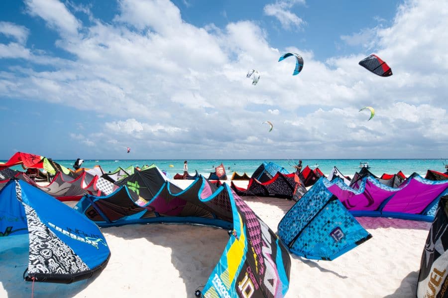 Kites rest on the beach ahead of a kitesurfing competition on Mamita Beach in Playa del Carmen Mexico