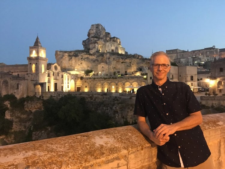 Michael stands in San Pietro Caveoso Church below Madonna de Idris in Matera