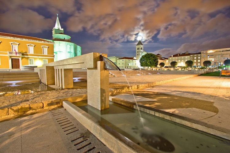 Old Zadar Roman forum fountain night view