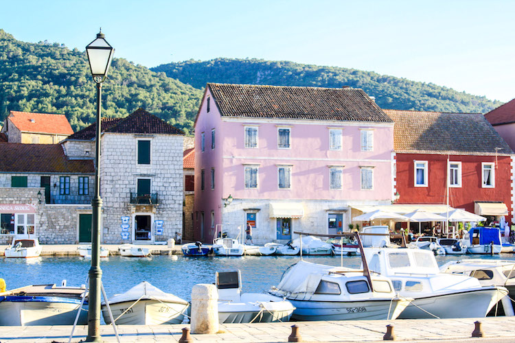 Colorful buildings line the harbor of Starigrad
