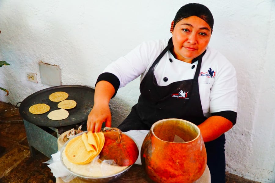 A chef making tortillas at El Meson de Marques